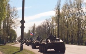 Russian troops driving tanks to the border with Ukraine in April 2014